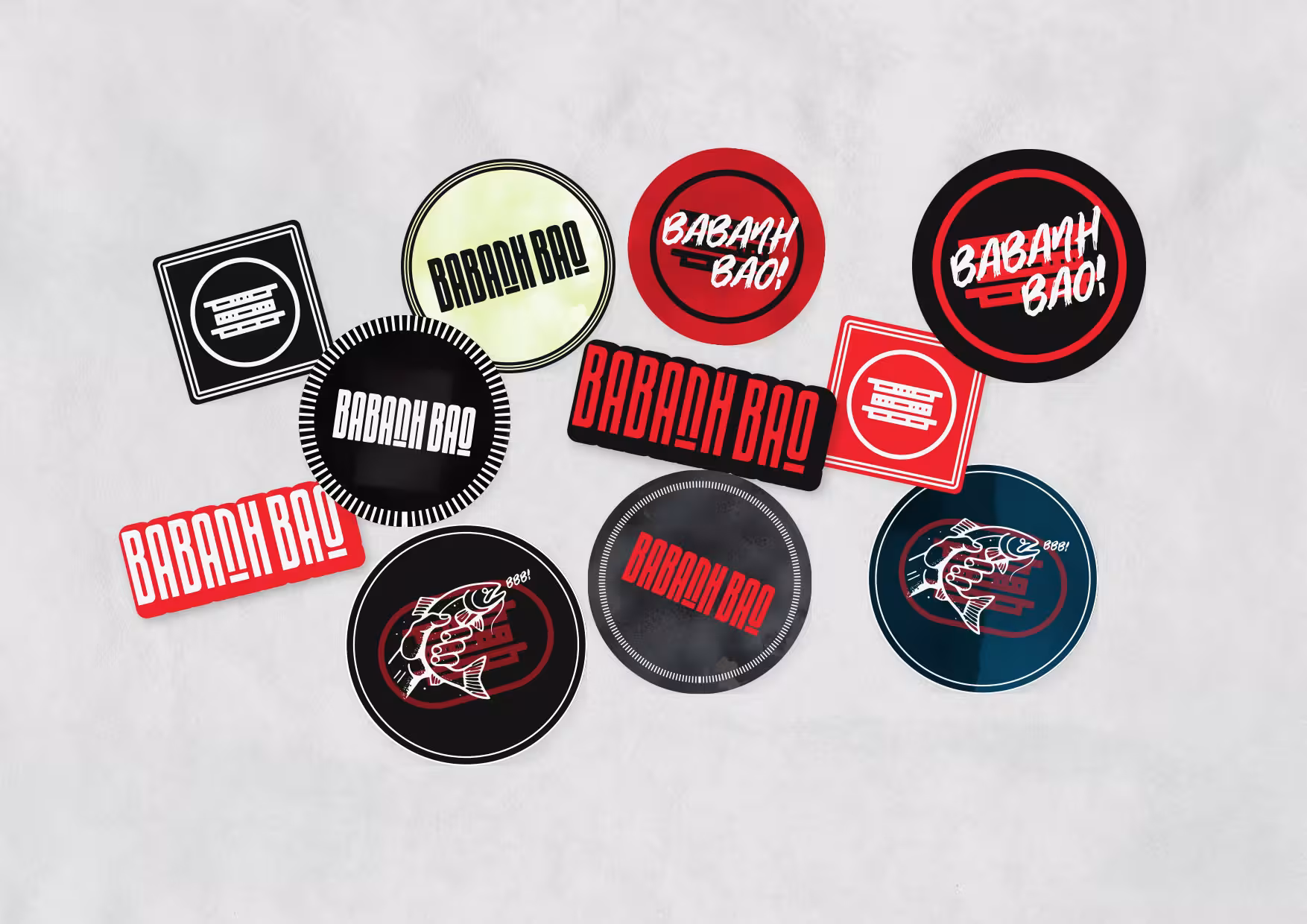 Babanh Bao stickers with various logo treatments, typography, and illustrated fish graphic.