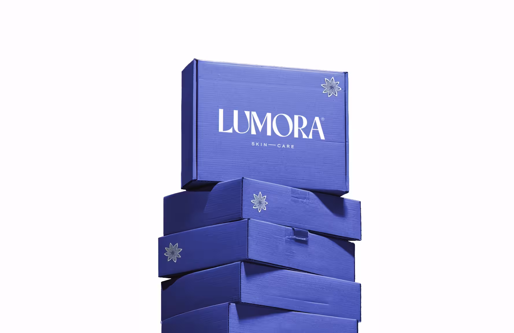Stacked Lumora skincare branded packaging boxes in deep blue.