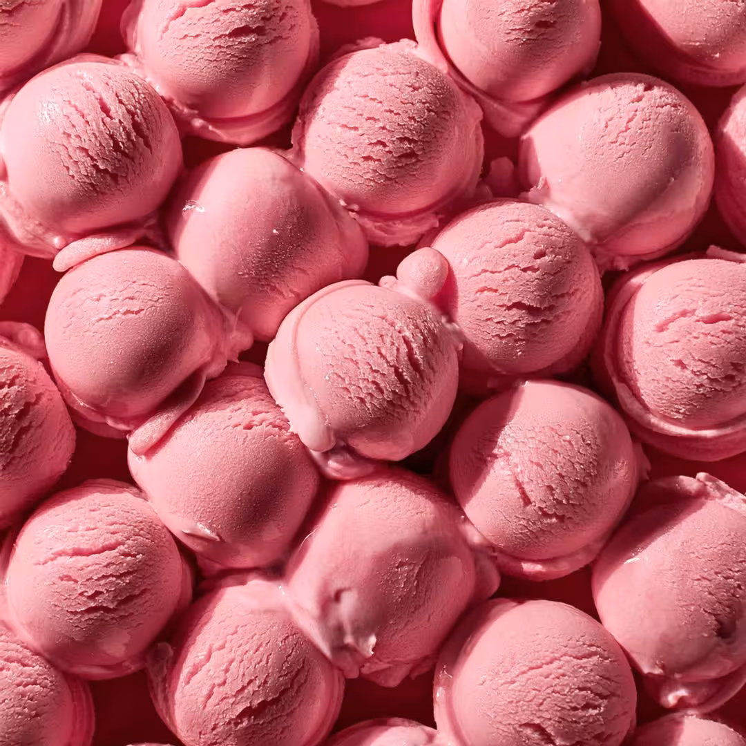 Background filled with pink ice cream scoops.