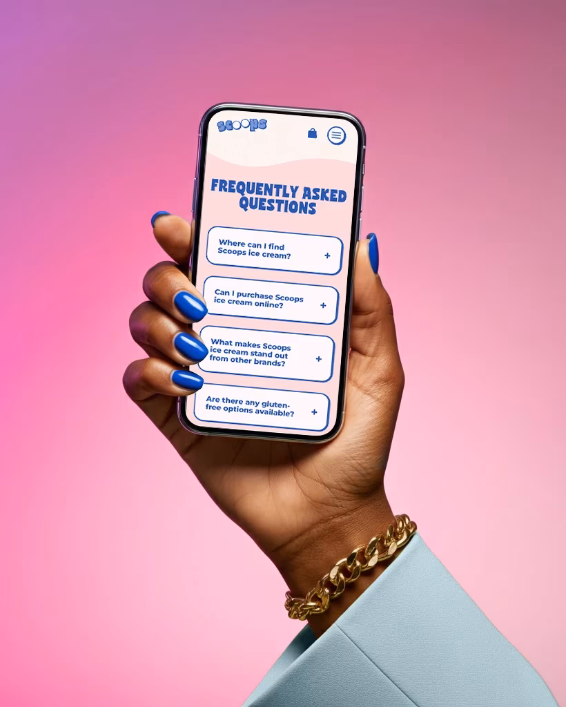 Scoops mobile website FAQ page shown on a smartphone against a pink studio background.